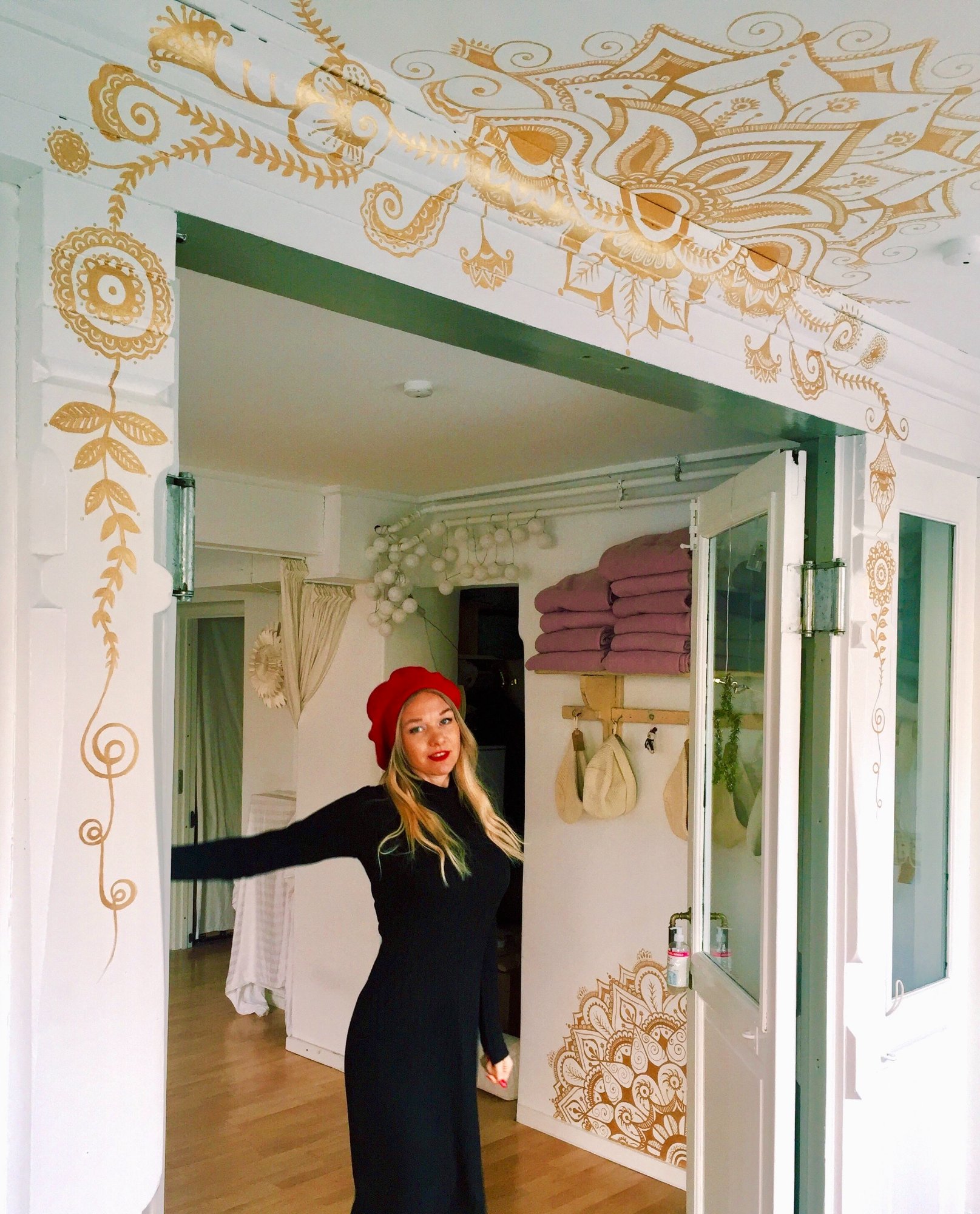 Gold mandala ceiling and walls in a yoga studio