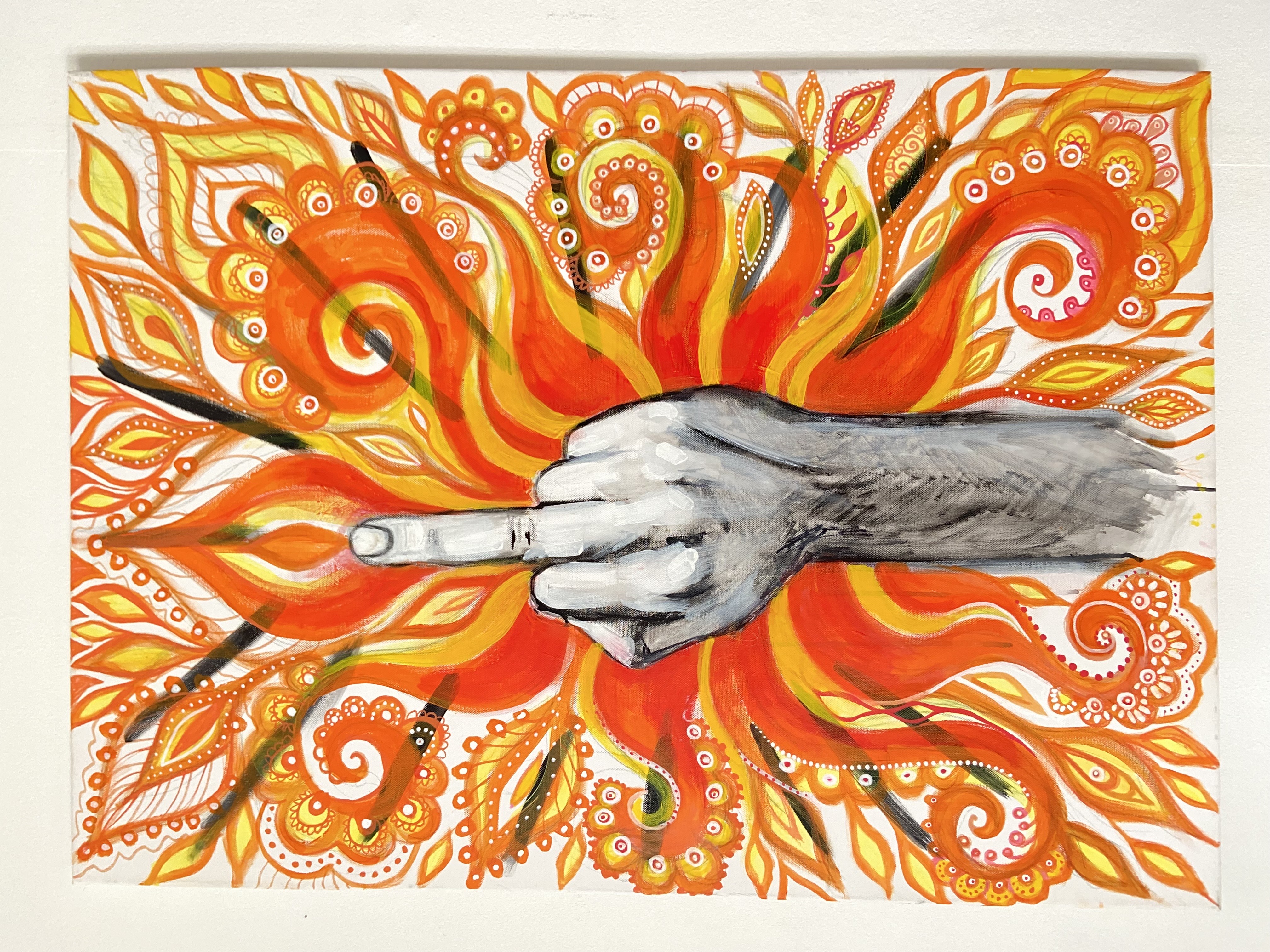 Orange floral background with expressive hand